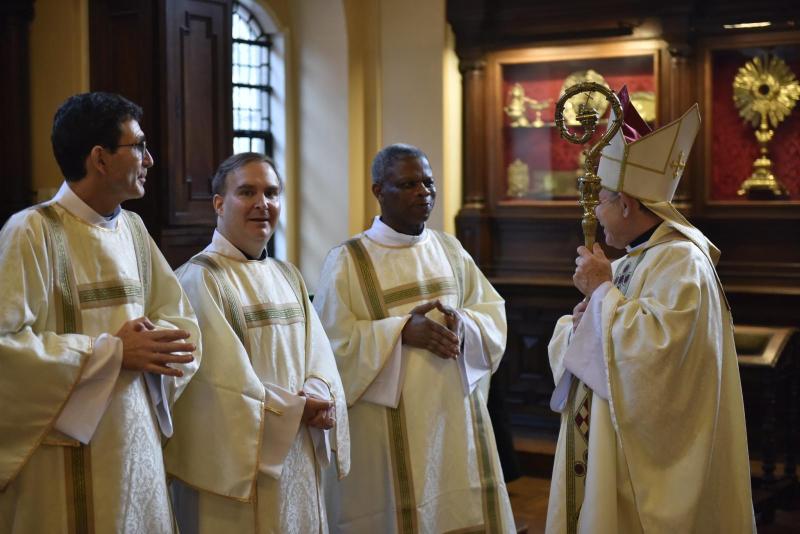 Three men ordained as Permanent Deacons