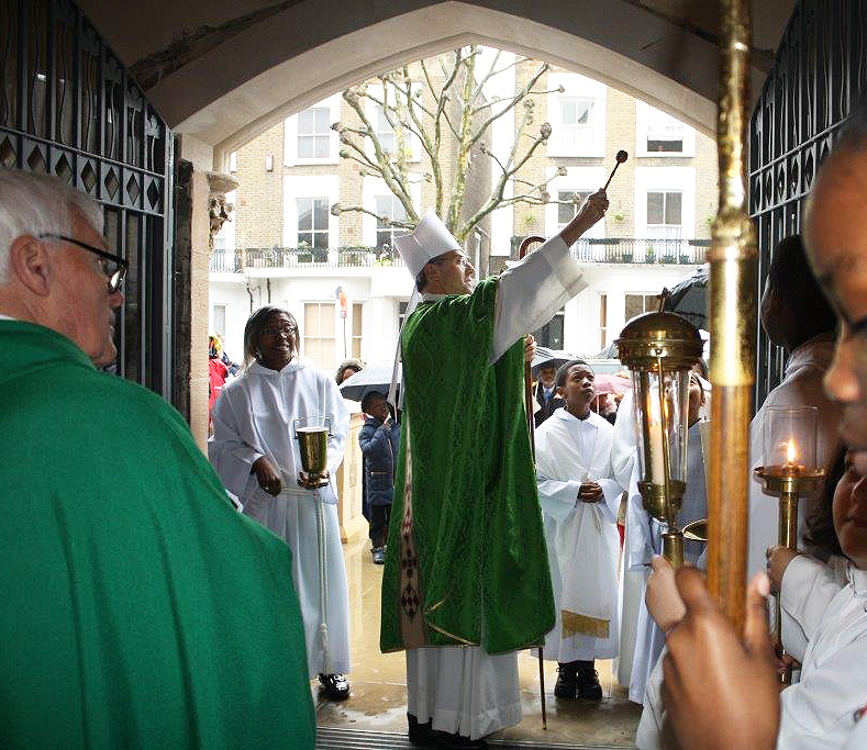 Bishop Nicholas Blesses New Doors at Our Lady Help of Christians