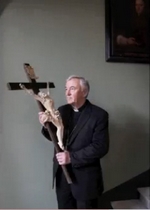 Archbishop Vincent Nichols with a cross