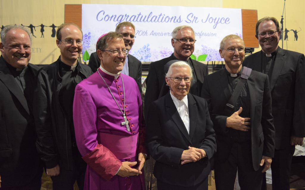 Pictured with Sr Joyce and Bishop John are: (left to right) Frs John Warnaby, Andrew Gallagher, Philip Dyer-Perry, Mehall Lowry; Canons Roger Taylor and Shaun Lennard.   
