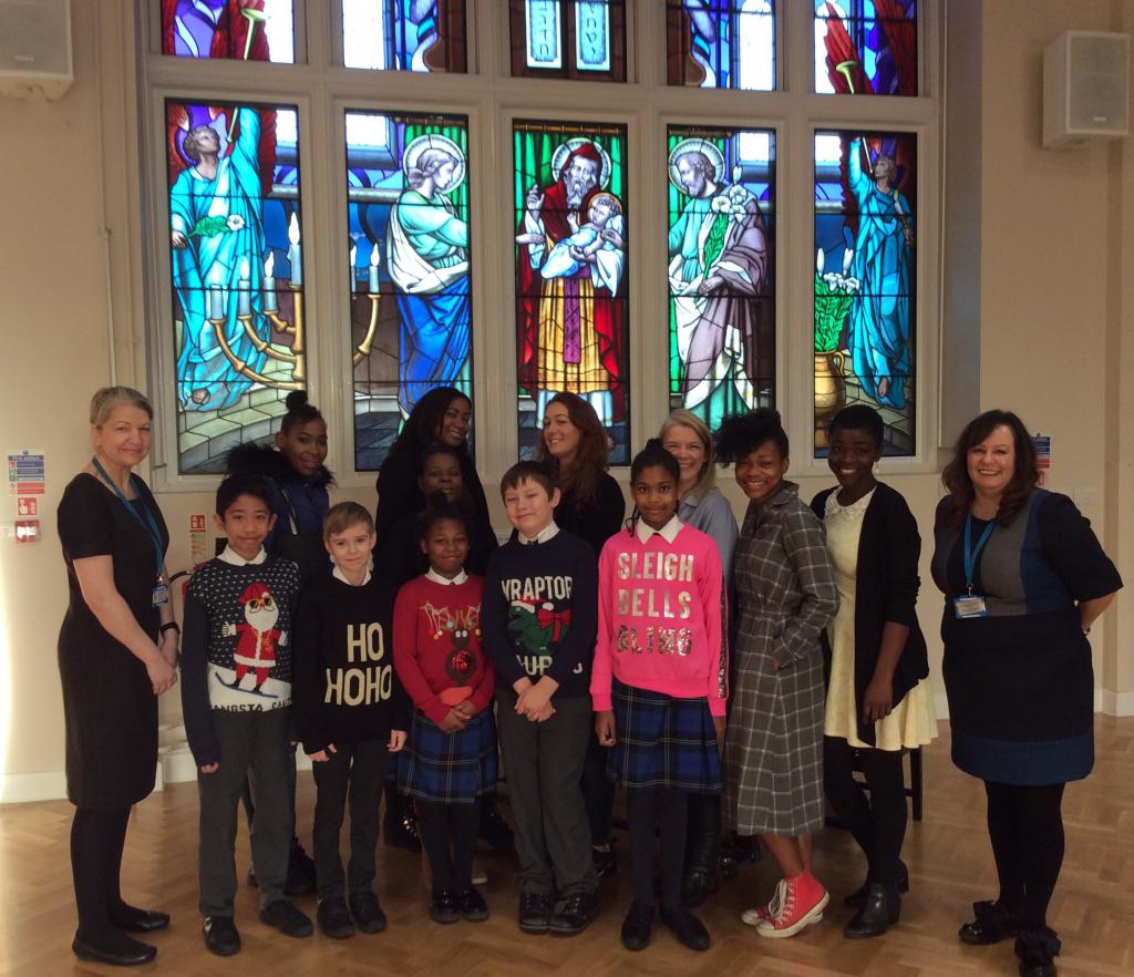 Parents and pupils of St Joseph's with Headteacher Mrs Titus (R) and Deputy Head Ms Kirby (L).