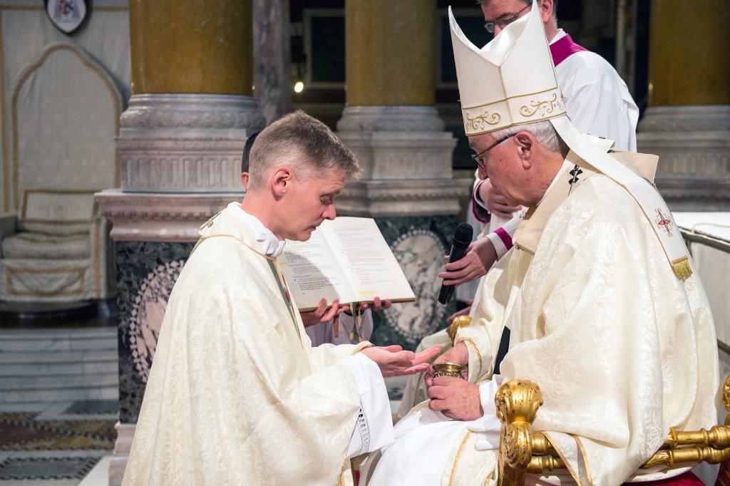 Fr Ben is anointed with Chrism