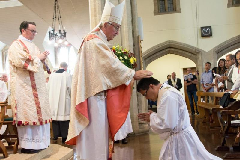 Cardinal Vincent ordaining Rev Antonio Pineda to the priesthood